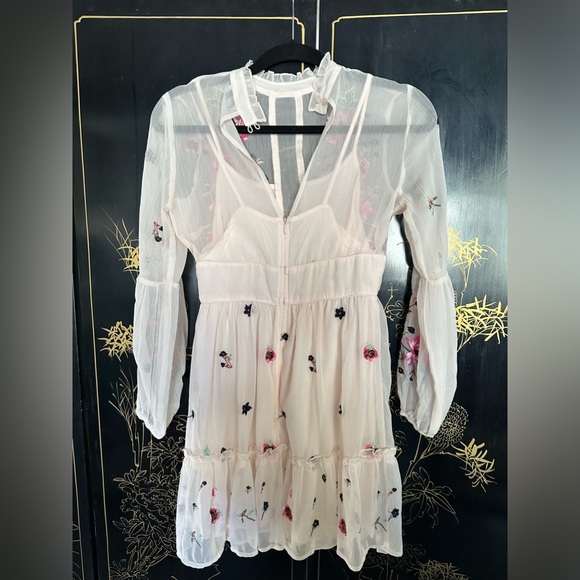 white dress with flower patches - Picture 2 of 2